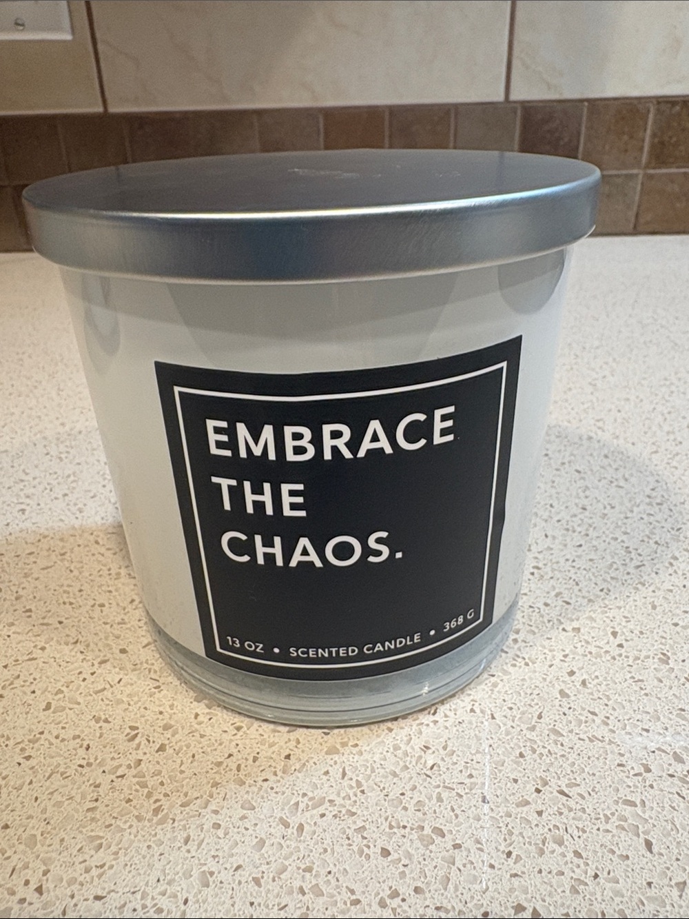 Embrace The Chaos Scented Candle - White with Silver Lid